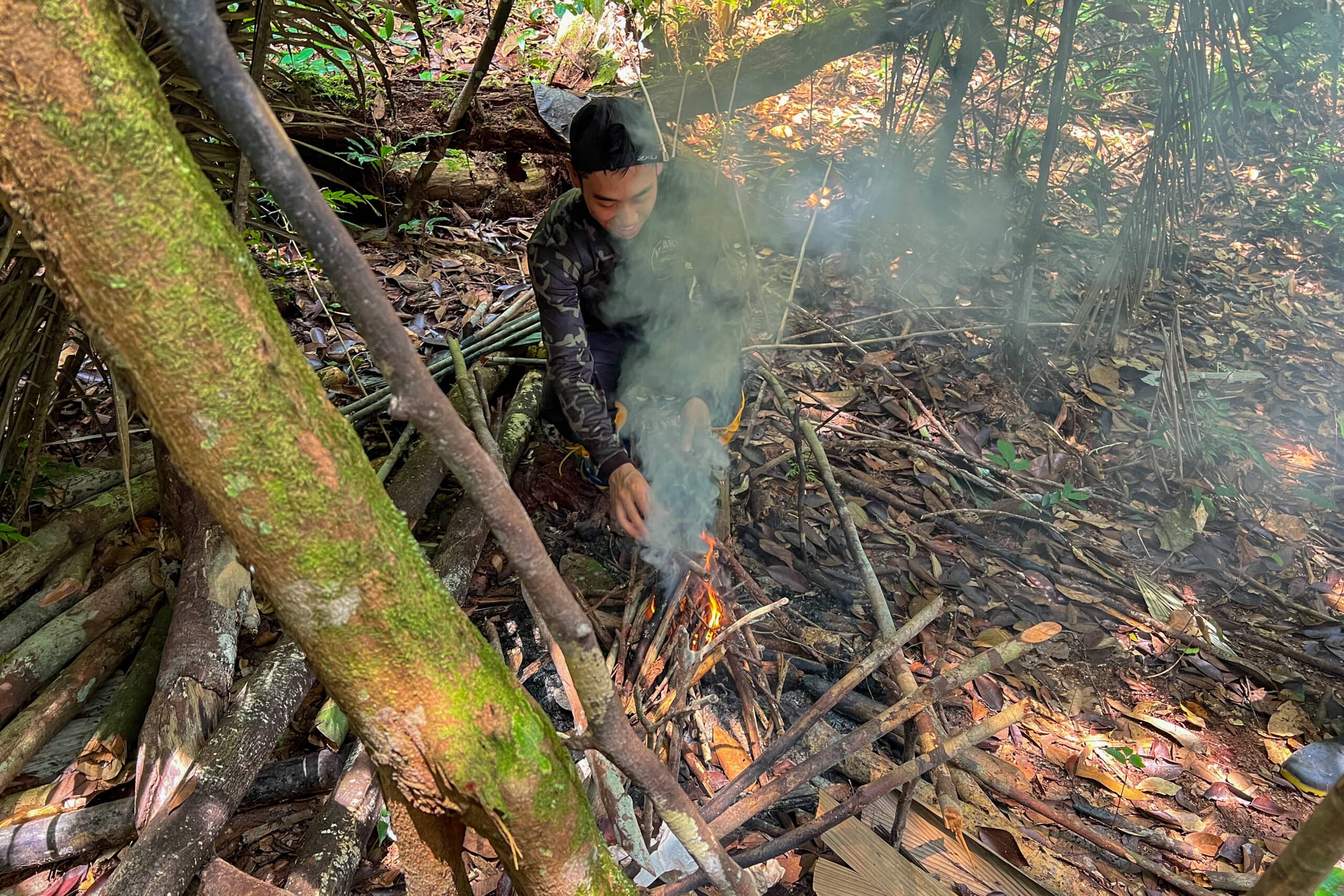 starting a fire in Amazon forest