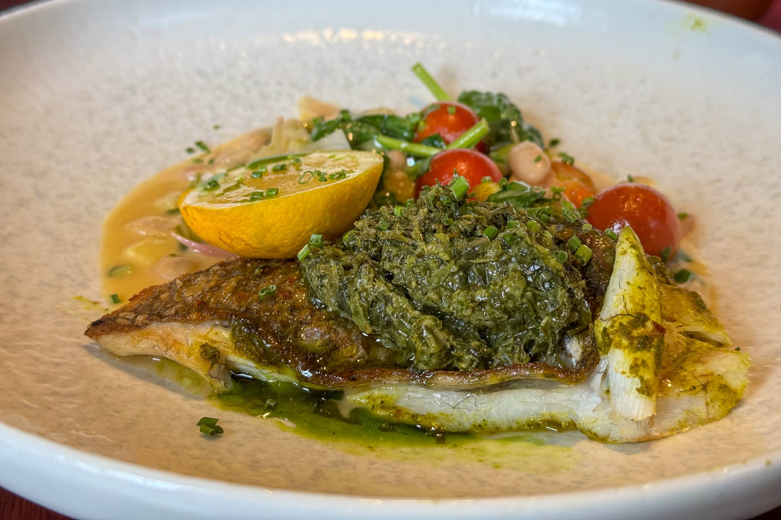 Pan fried fresh fish fillet in lemon sauce